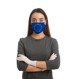 Woman wearing medical mask with European Union flag on white background. Coronavirus outbreak in Europe