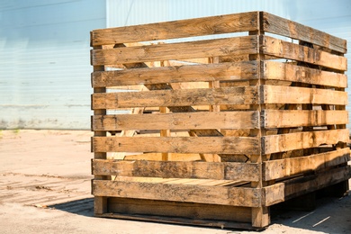 Old empty wooden crate at warehouse backyard