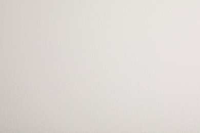 Blank white canvas as background, closeup view