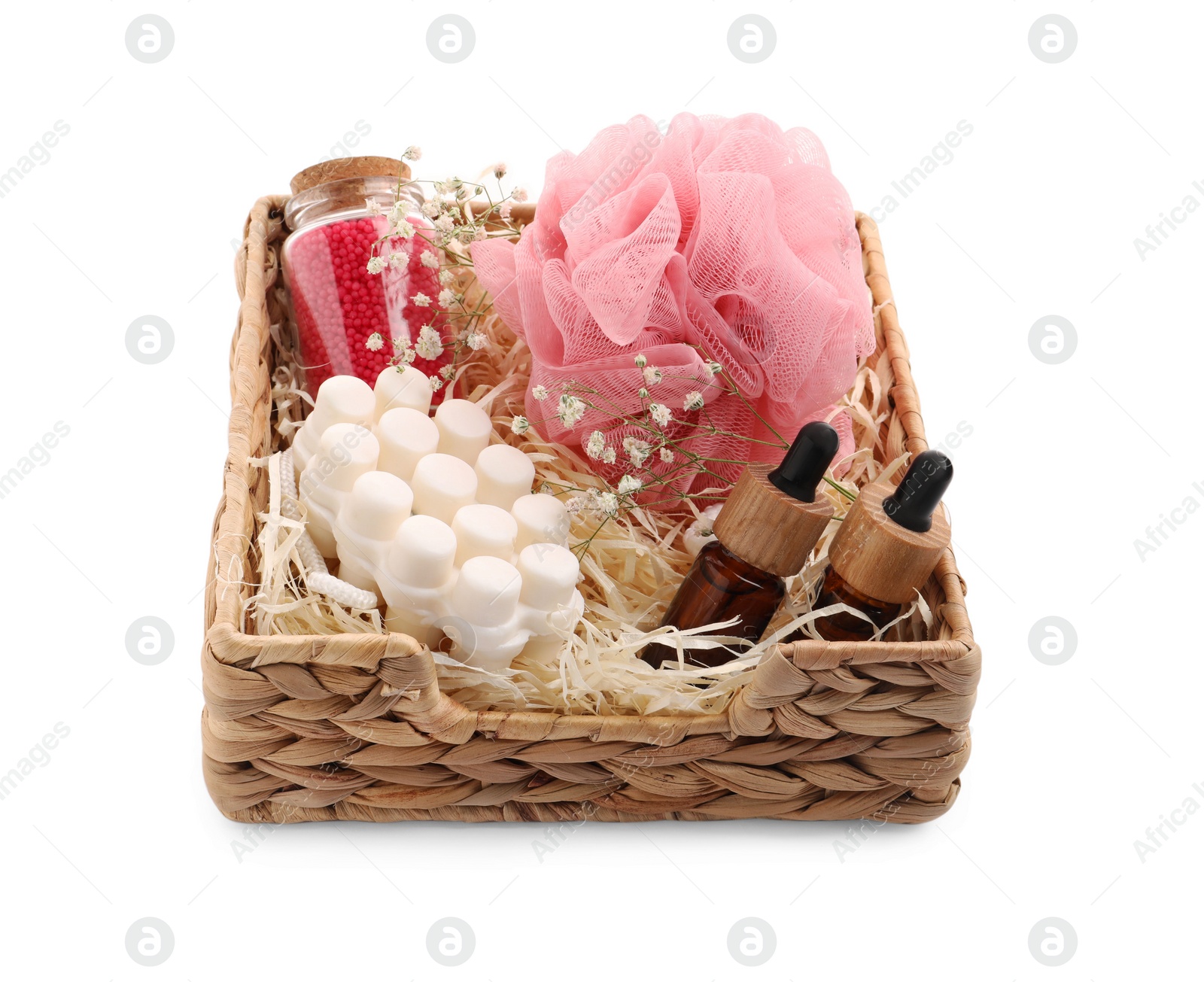 Photo of Spa gift set of different luxury products in wicker basket on white background