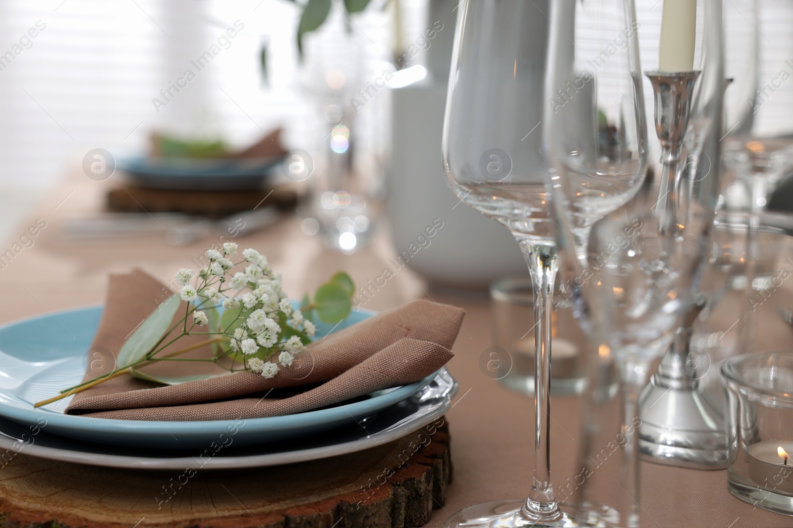 Photo of Festive table setting with beautiful tableware and decor, closeup