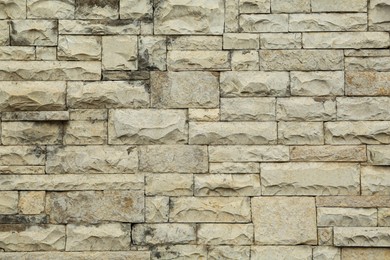 Texture of stone wall as background, closeup