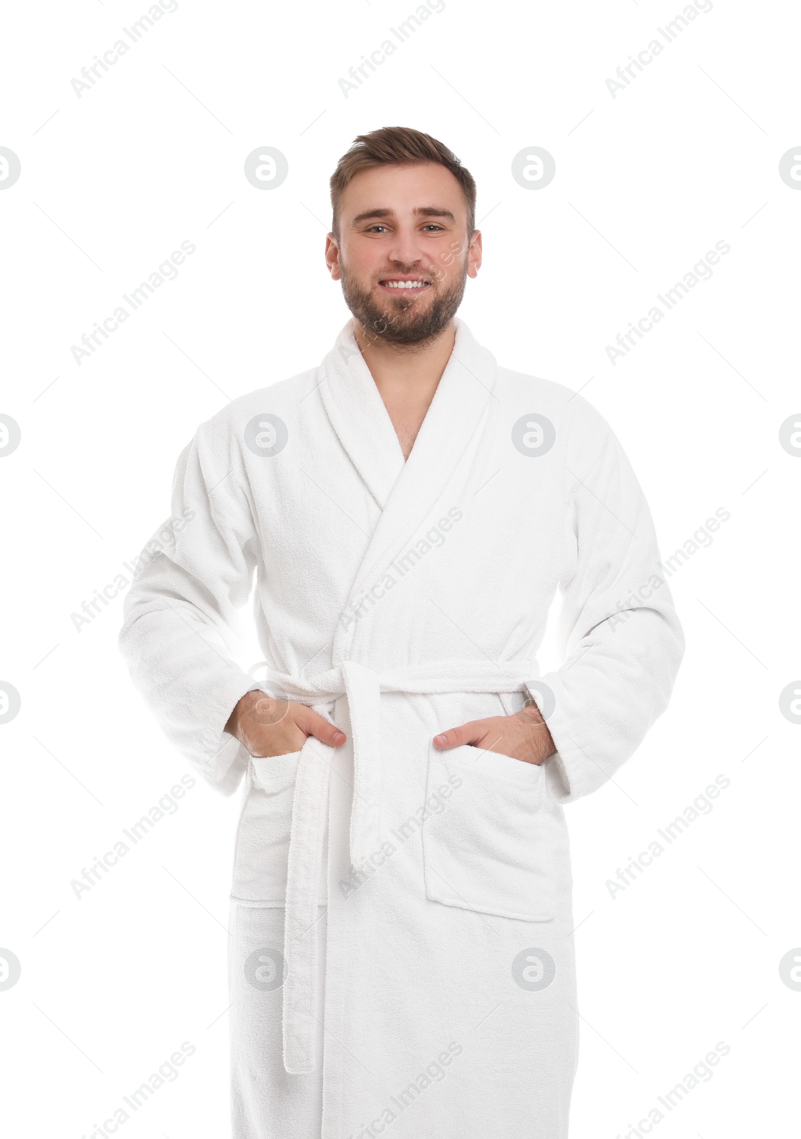 Photo of Handsome man wearing bathrobe on white background