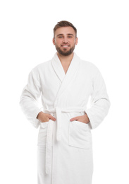 Photo of Handsome man wearing bathrobe on white background