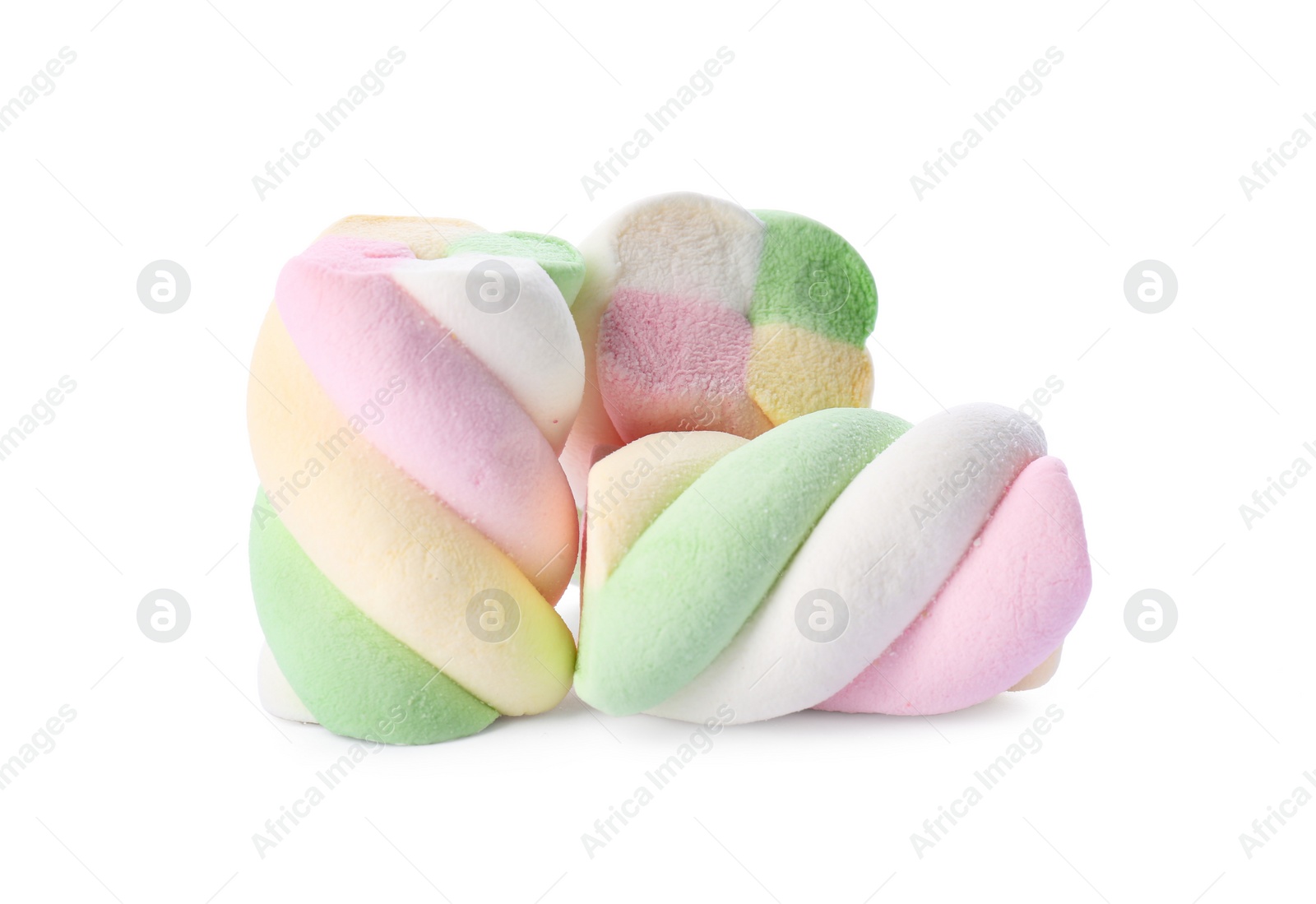 Photo of Three delicious colorful marshmallows on white background