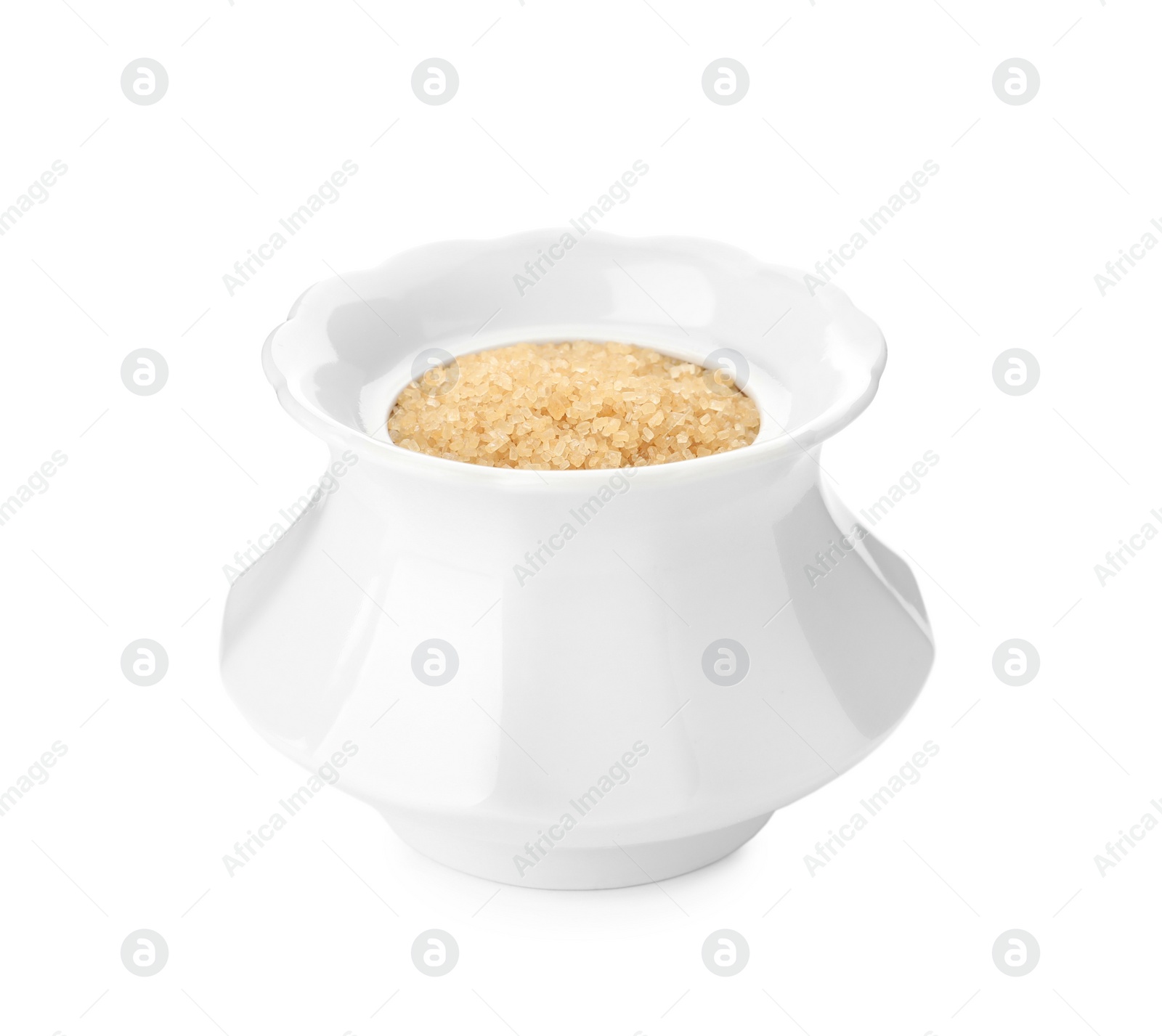 Photo of Ceramic bowl with brown sugar isolated on white