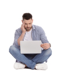 Emotional man with laptop on white background