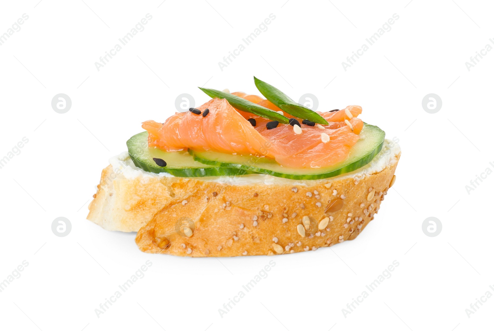 Photo of Tasty canape with salmon, cucumber and cream cheese isolated on white