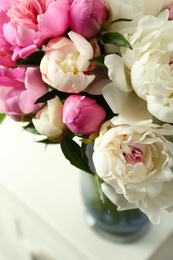 Photo of Bouquet of beautiful fresh peonies indoors, closeup