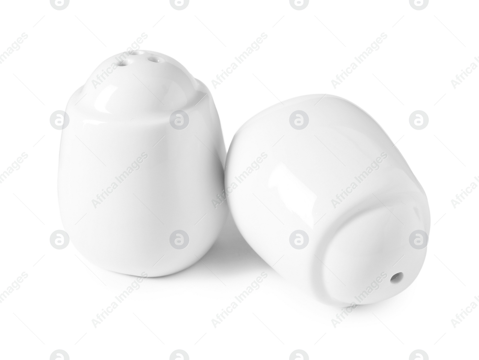 Photo of Salt and pepper shakers isolated on white