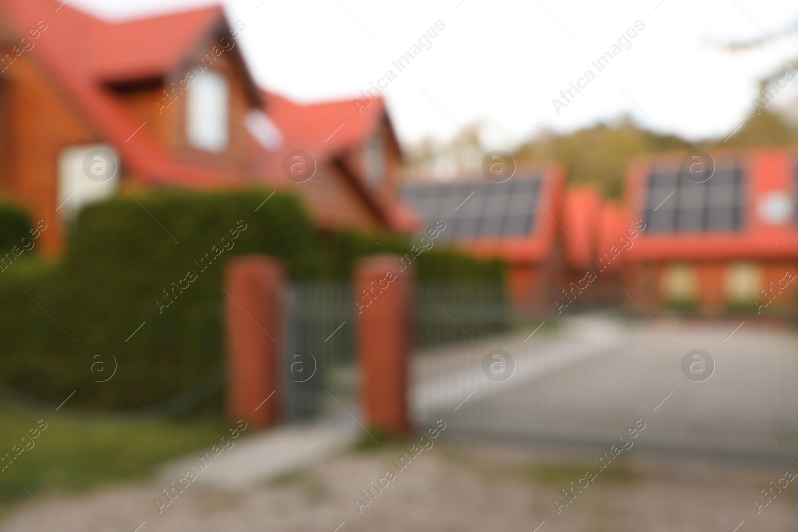 Photo of Beautiful houses outdoors, blurred view. Real estate for rent