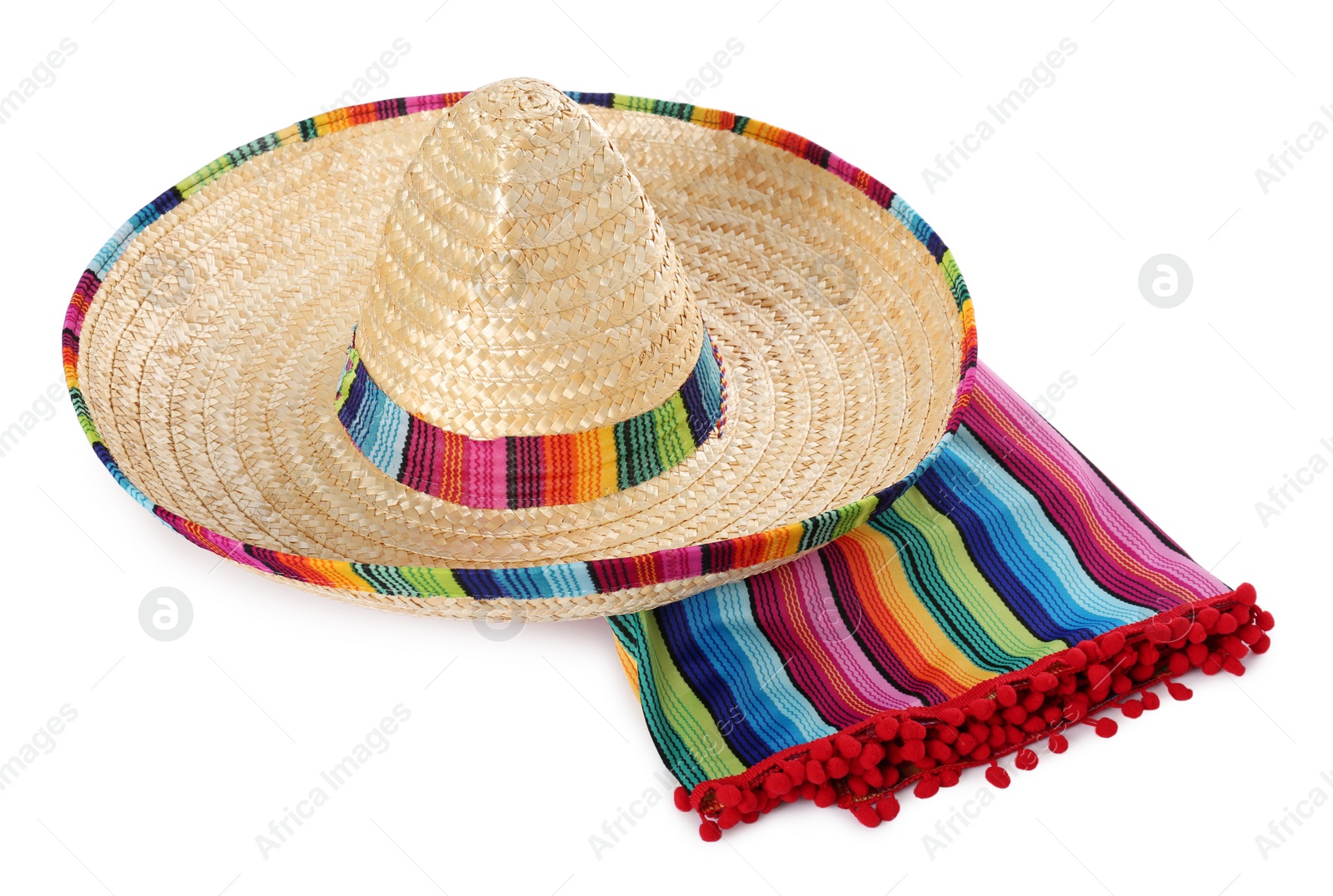 Photo of Mexican sombrero hat and colorful poncho isolated on white