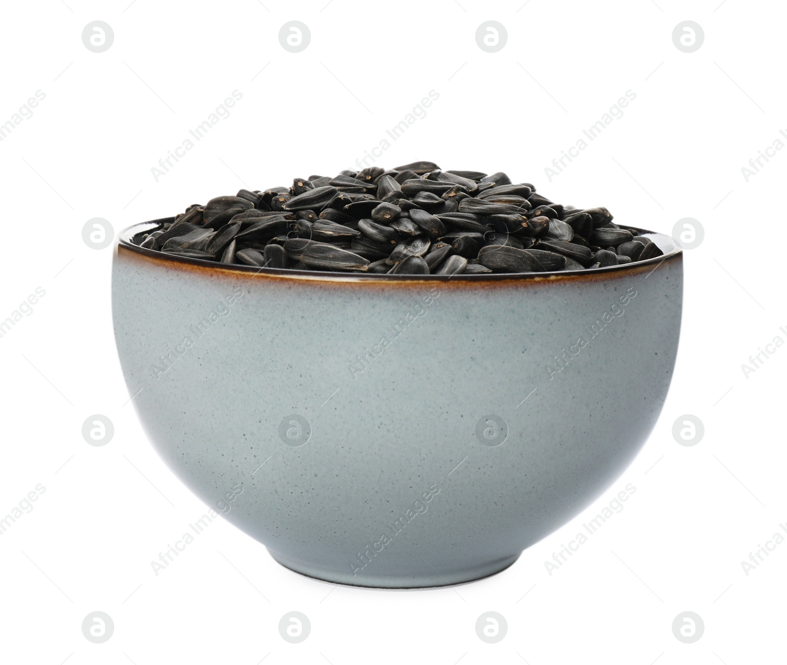 Photo of Sunflower seeds in bowl isolated on white