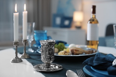 Photo of Table served for Passover (Pesach) Seder indoors