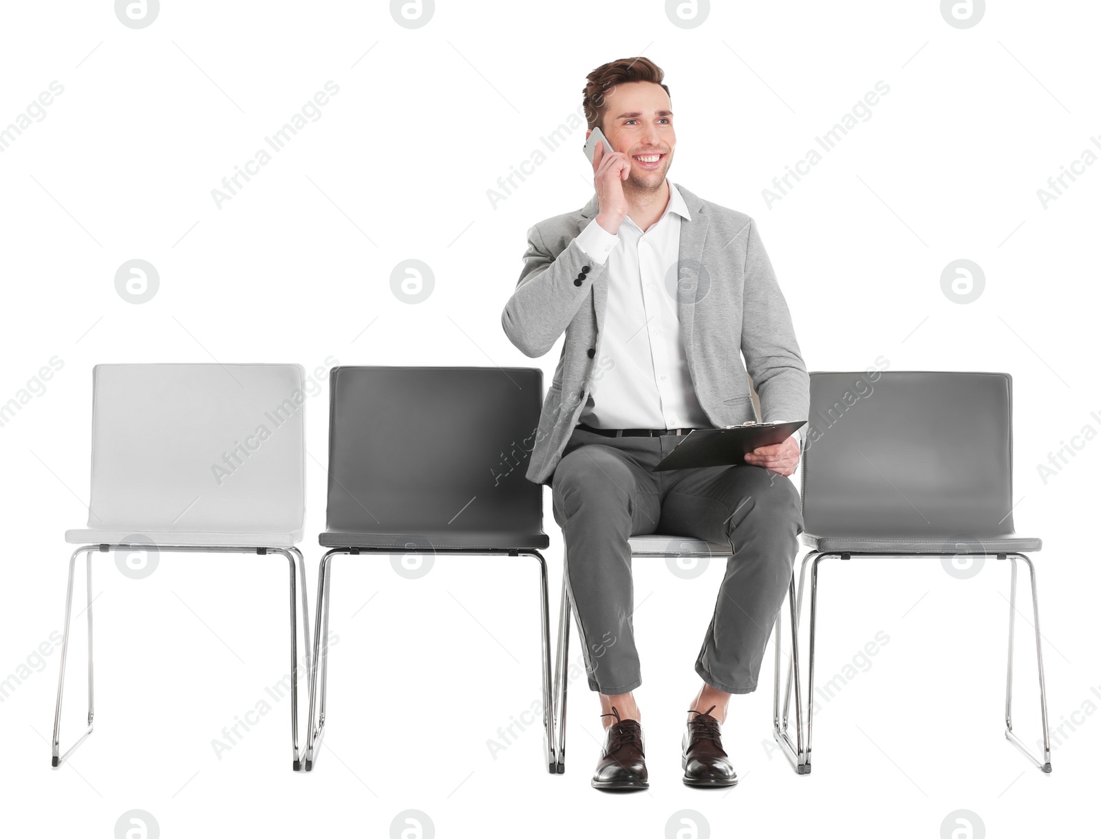 Photo of Young man waiting for job interview on white background