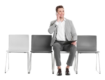 Photo of Young man waiting for job interview on white background