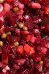 Photo of Delicious fresh vinaigrette salad as background, top view