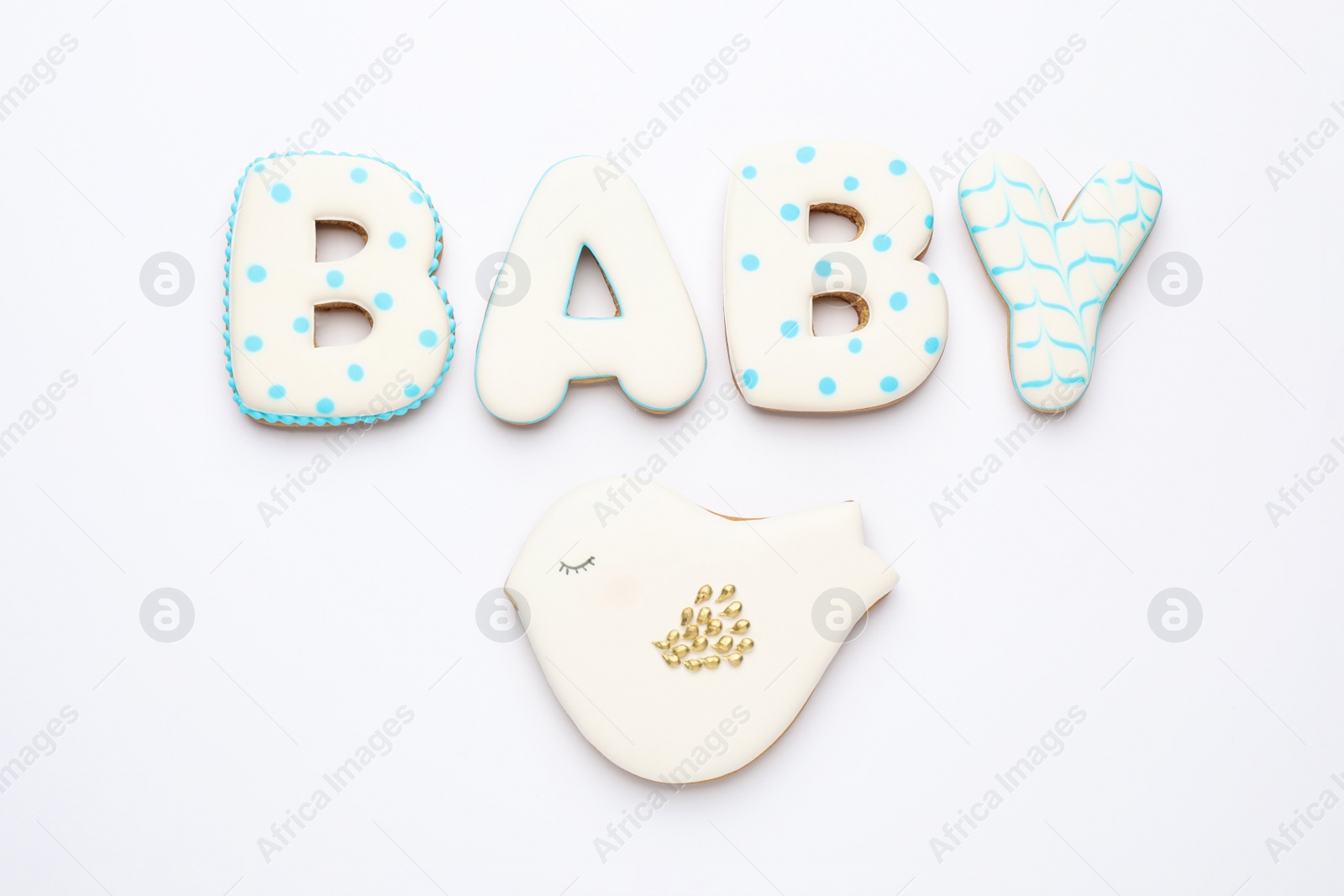 Photo of Word BABY made of tasty cookies on white background, top view 