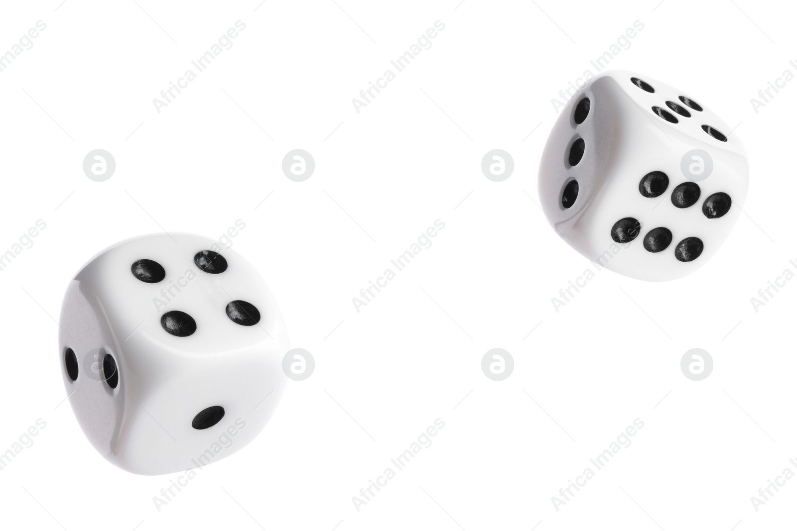 Image of Two dice in air on white background