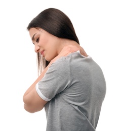 Photo of Young woman suffering from pain in neck on white background