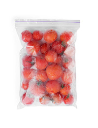 Frozen tomatoes in plastic bag isolated on white, top view. Vegetable preservation