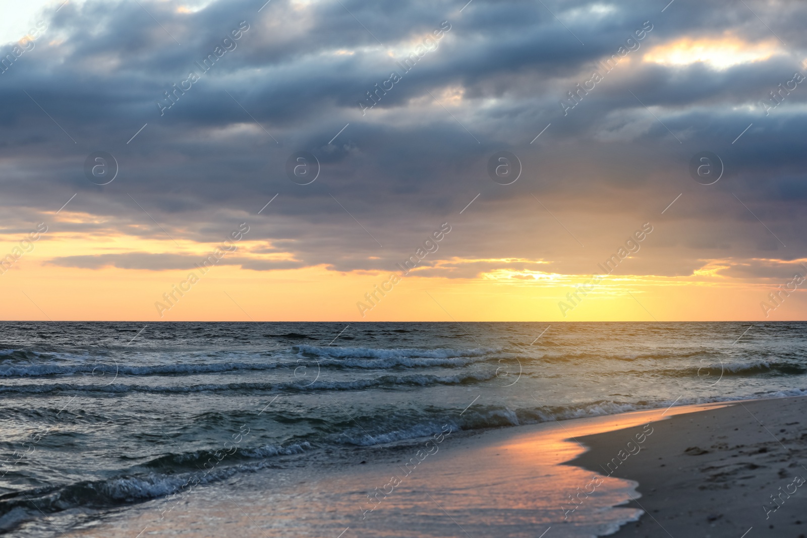 Photo of Picturesque view of beautiful sky with clouds over tropical beach at sunset