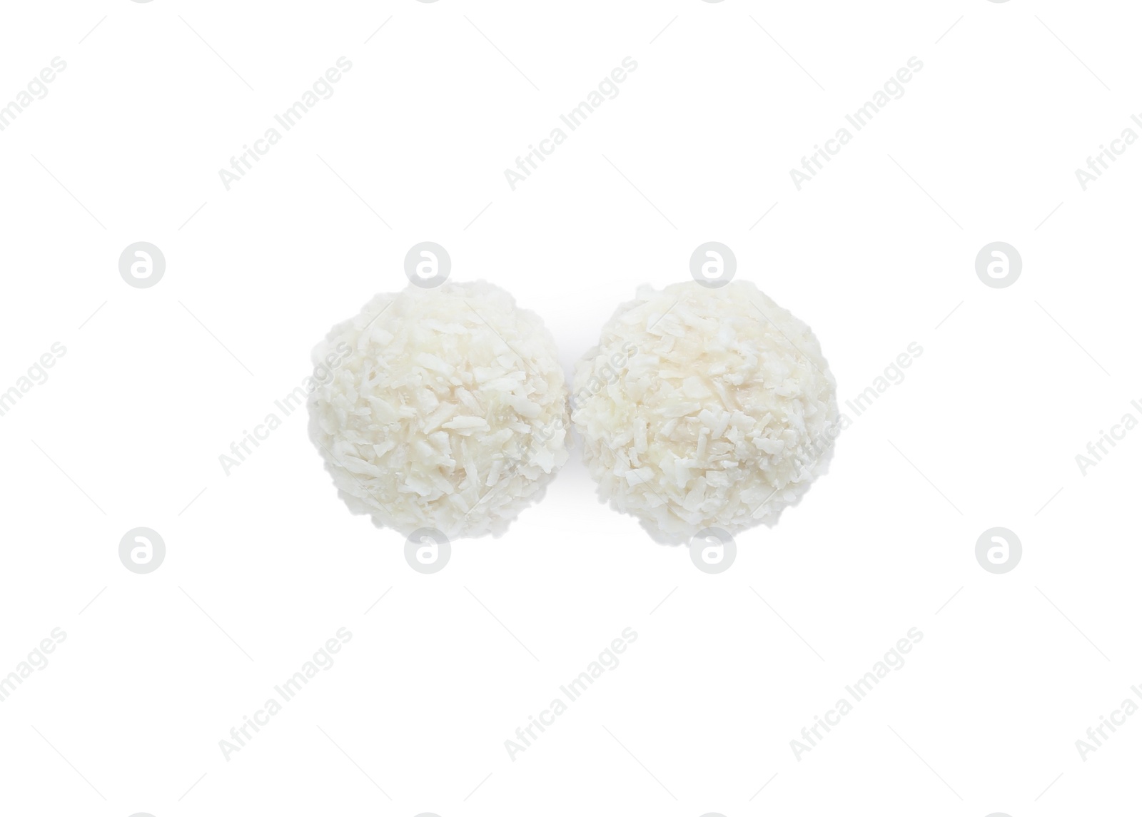 Photo of Tasty coconut balls isolated on white, top view