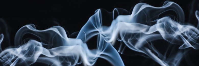 Image of Smoke on black background, closeup. Banner design