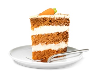 Piece of sweet carrot cake with delicious cream on plate against white background