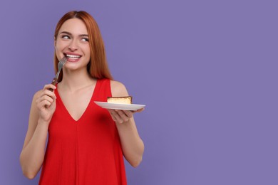 Photo of Young woman eating piecetasty cake on purple background, space for text