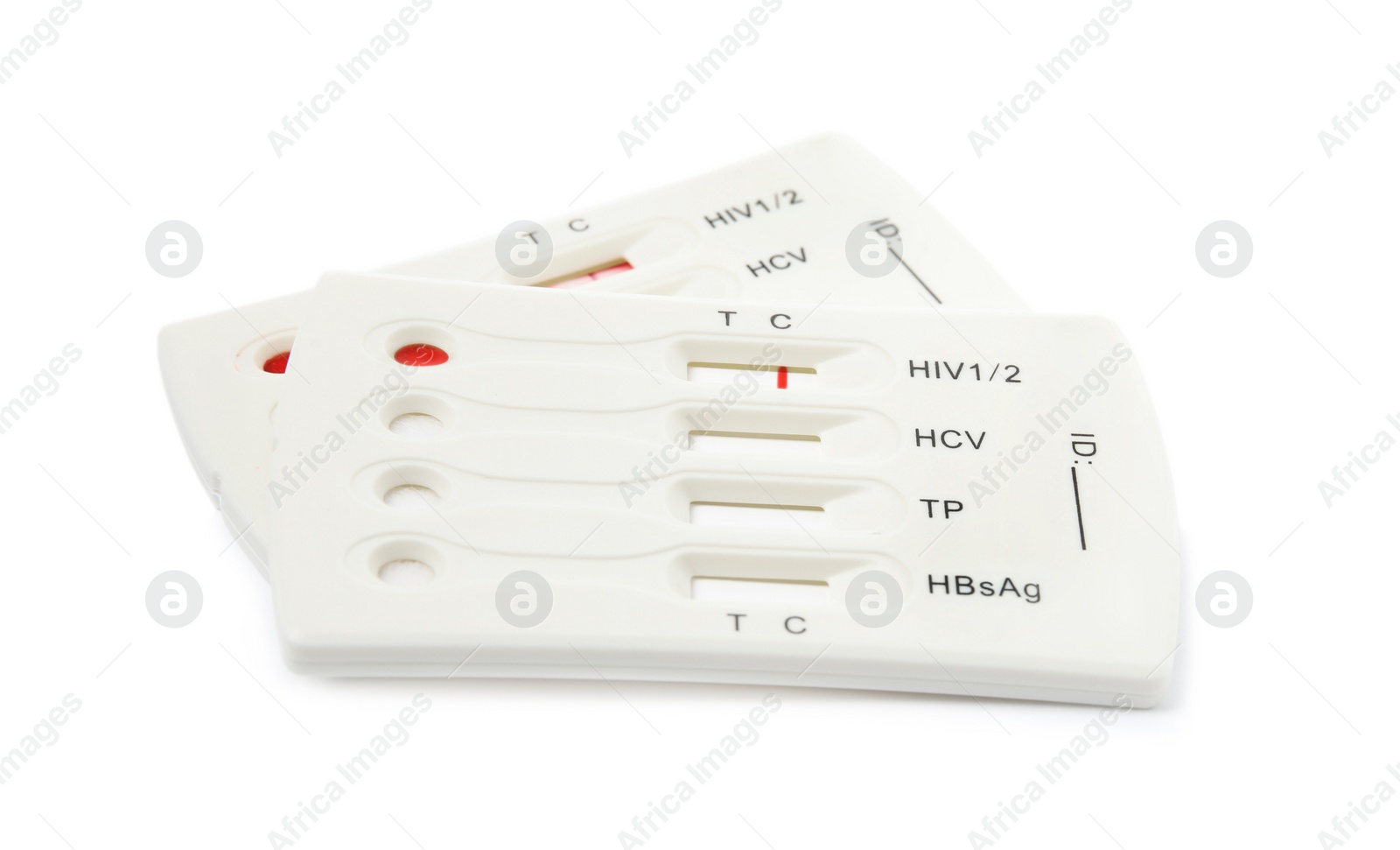 Photo of Two disposable express tests for hepatitis on white background