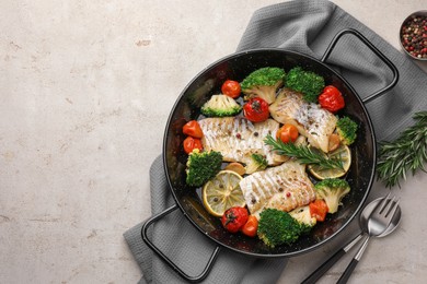 Tasty cod cooked with vegetables served on grey table, flat lay. Space for text