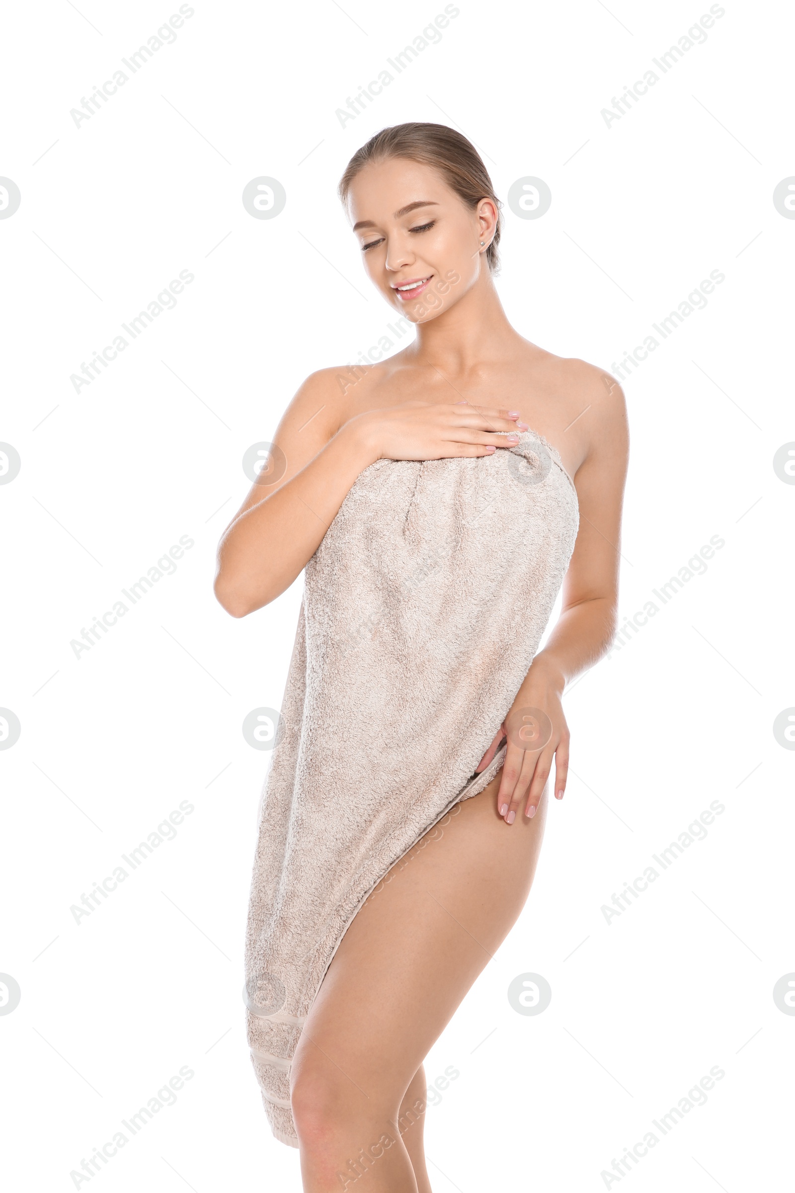 Photo of Portrait of young pretty woman with towel on white background