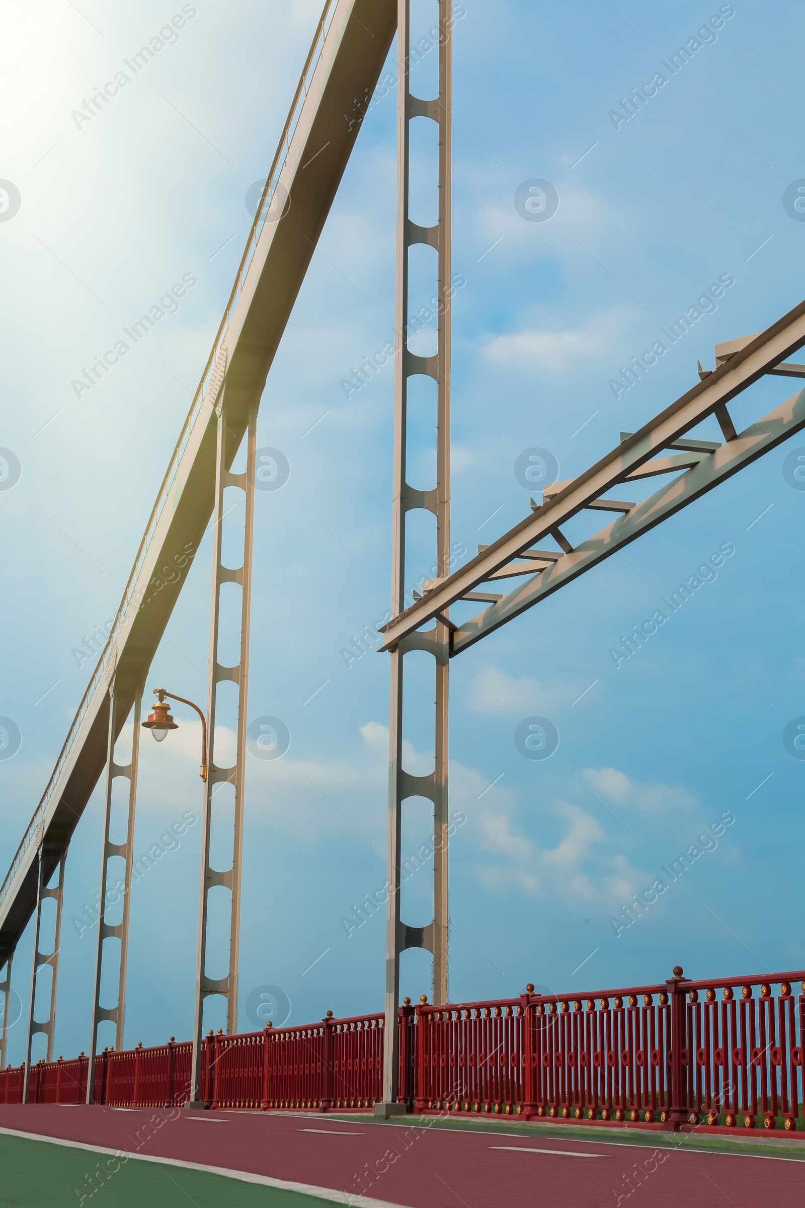 Photo of KYIV, UKRAINE - AUGUST 11, 2022: Beautiful pedestrian bridge on summer day