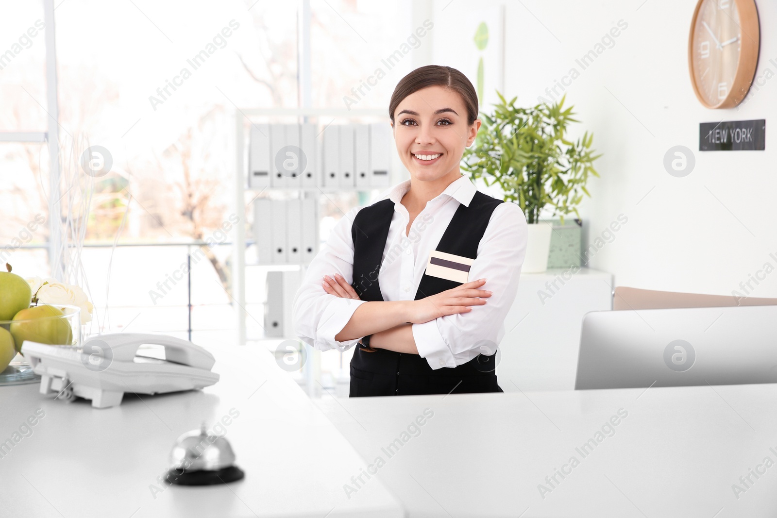 Photo of Portrait of female receptionist at workplace in hotel