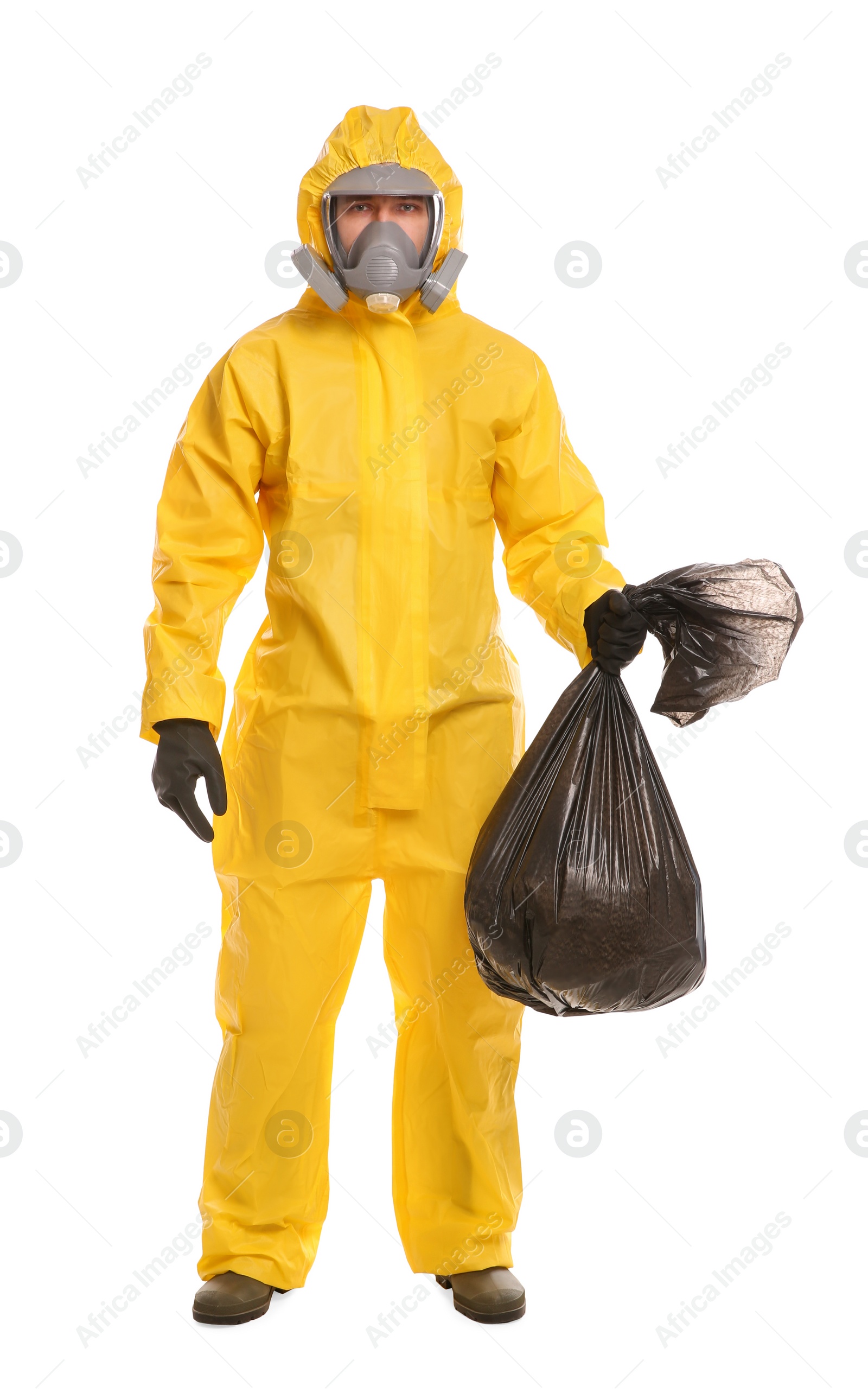 Photo of Man in chemical protective suit holding trash bag on white background. Virus research