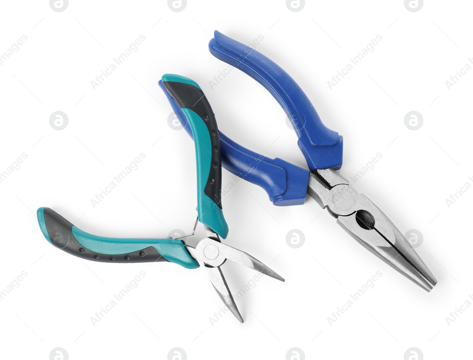 Photo of Different pliers isolated on white, top view