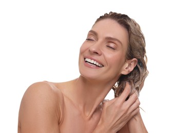 Photo of Beautiful happy woman washing hair on white background