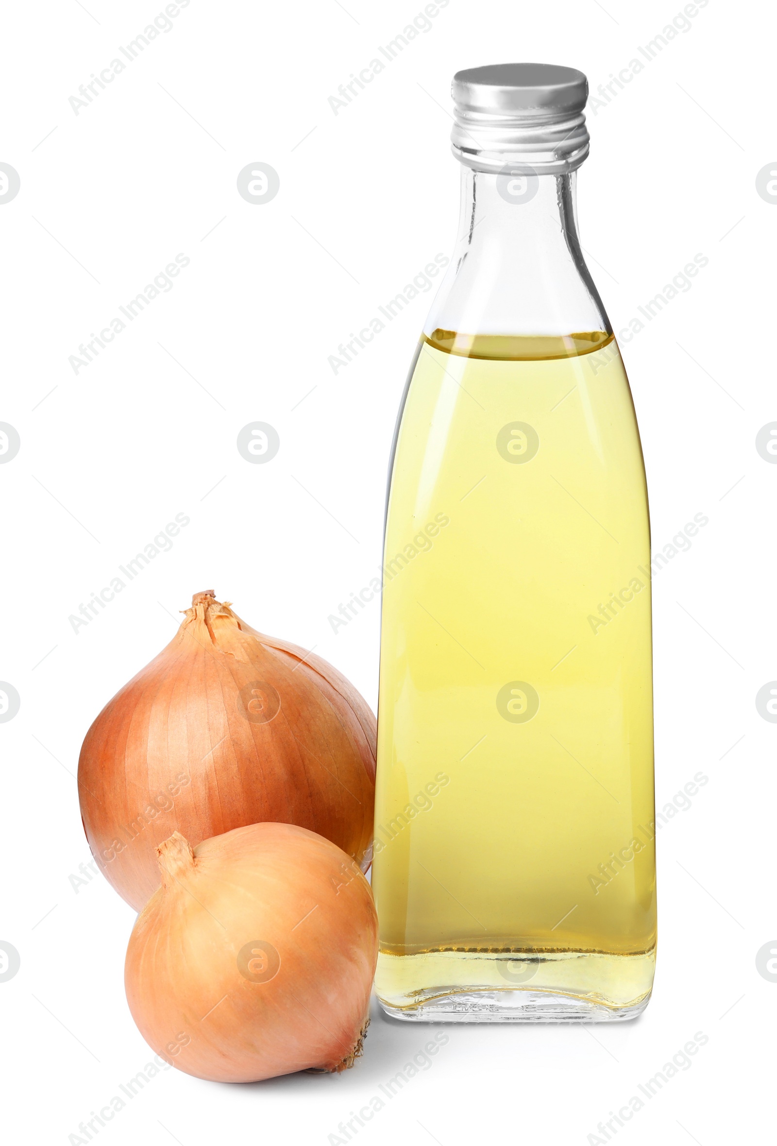 Photo of Glass bottle of onion syrup and fresh ingredient on white background