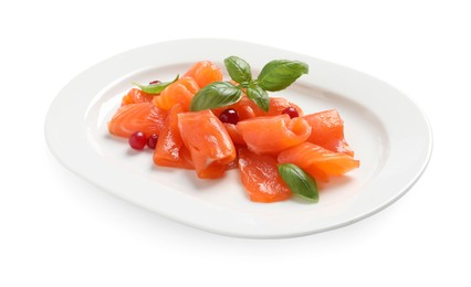 Photo of Salmon carpaccio with cranberries and basil isolated on white