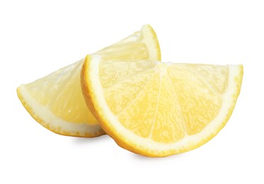 Photo of Pieces of fresh lemon isolated on white