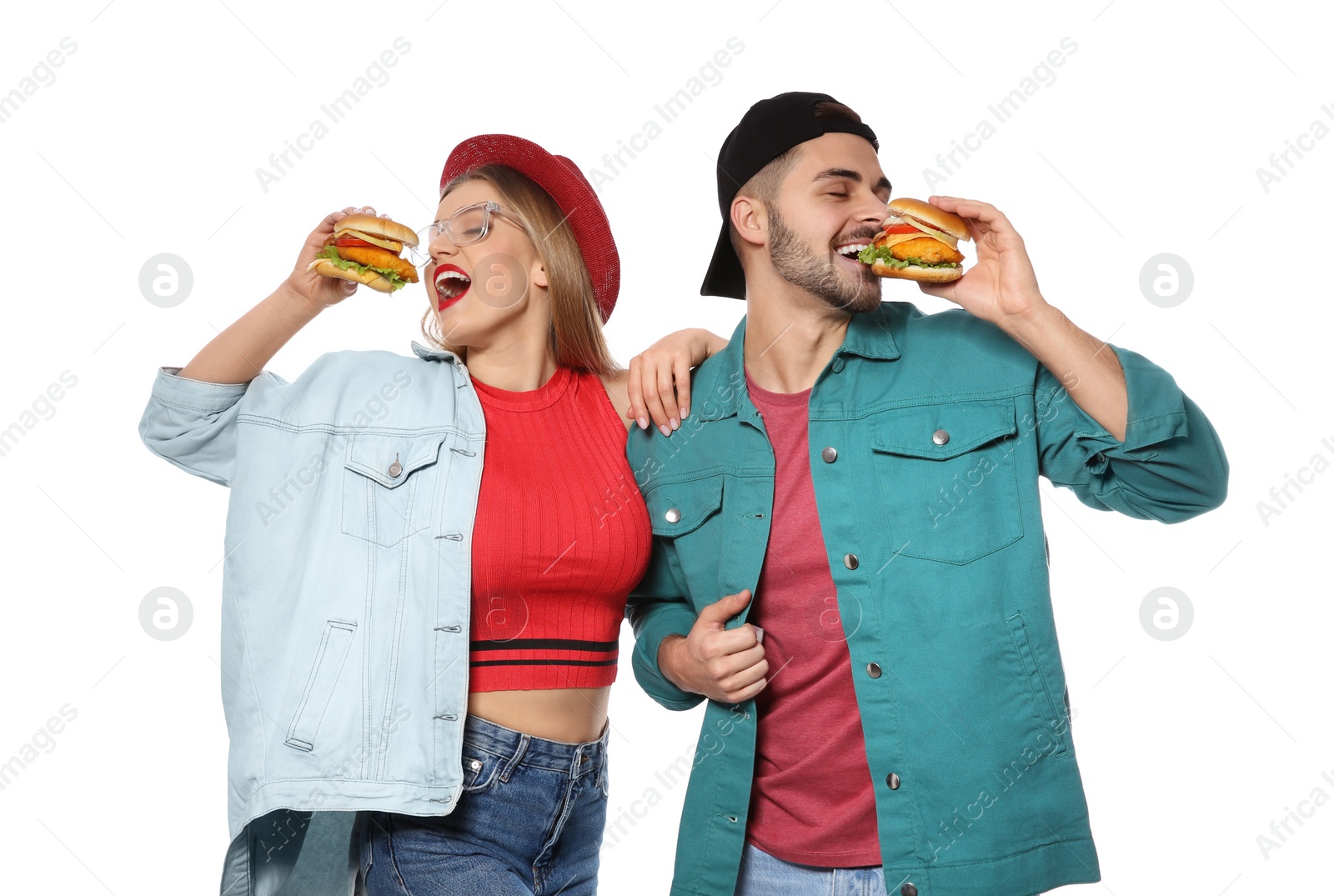 Photo of Happy couple with tasty burgers isolated on white