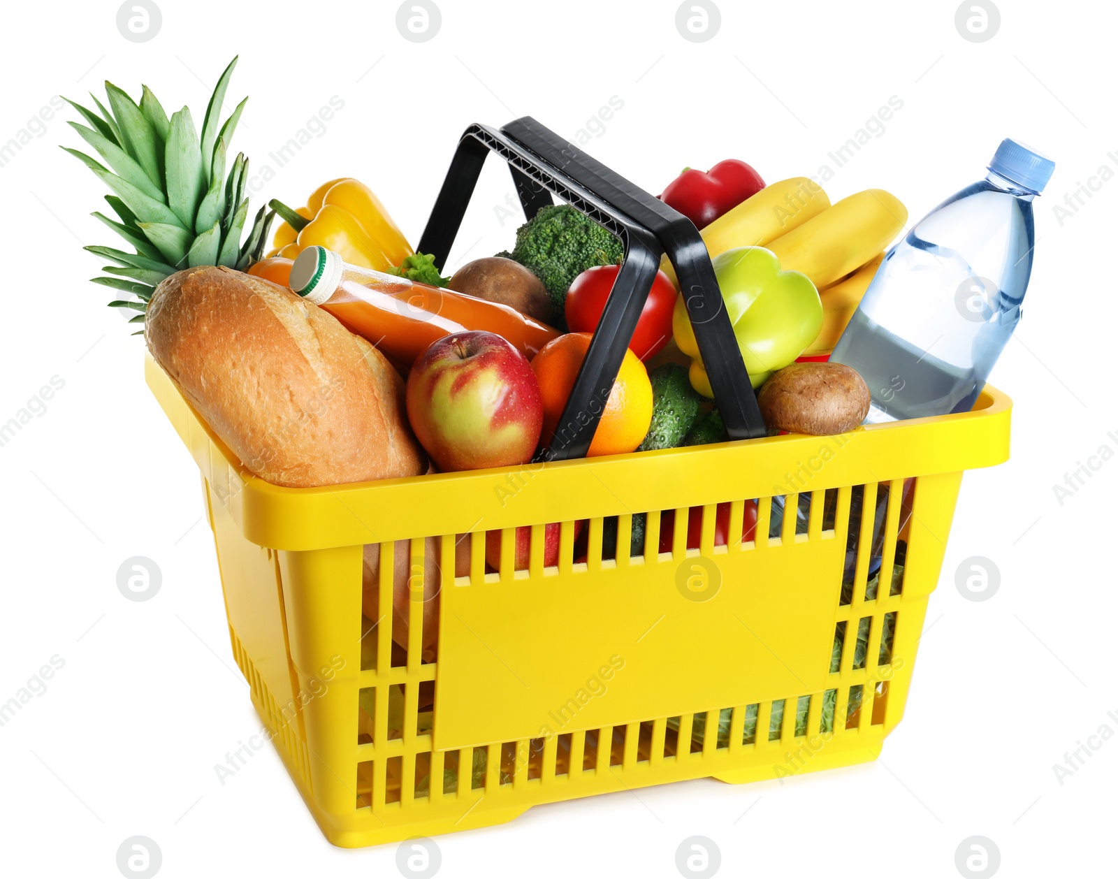 Photo of Shopping basket with grocery products on white background