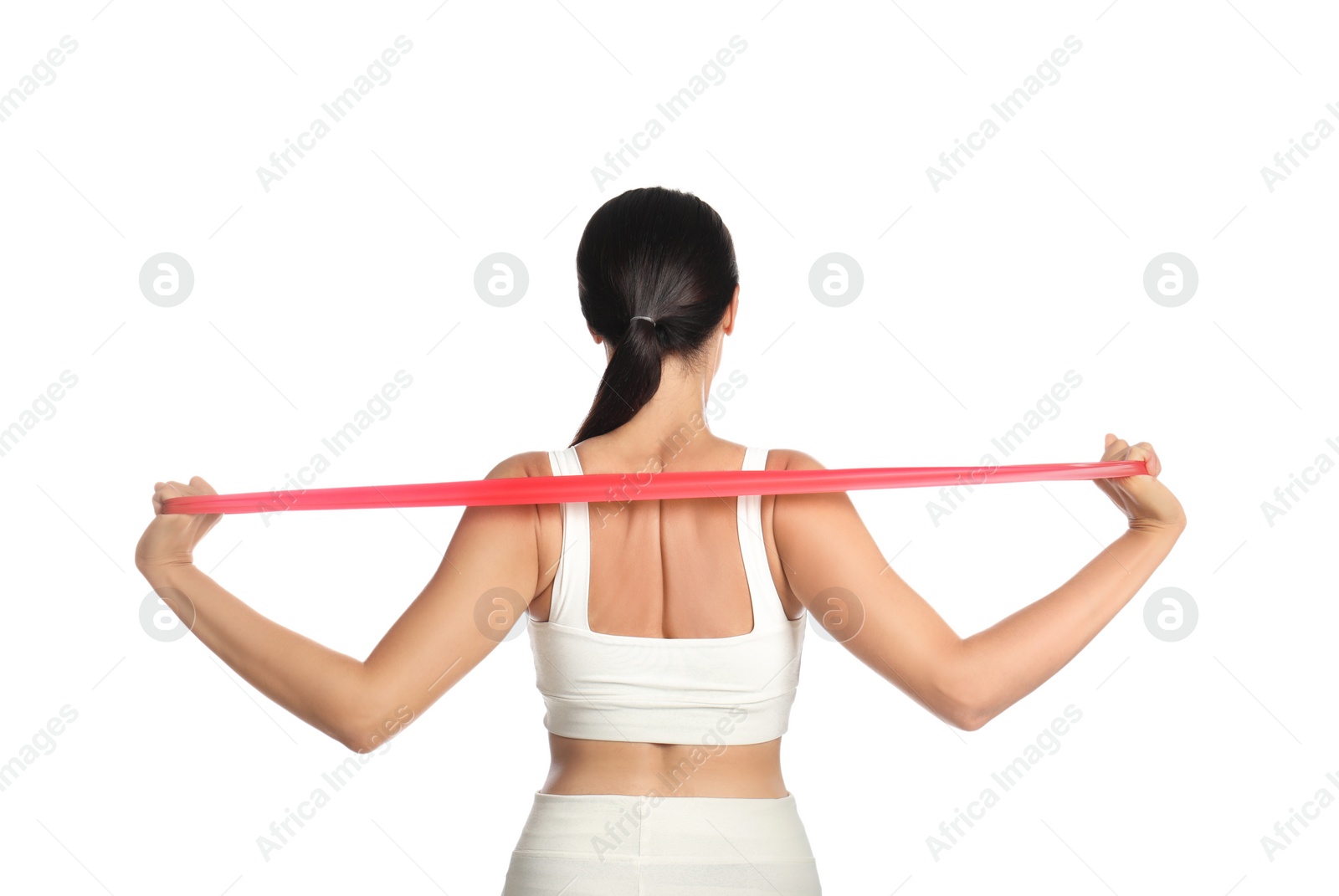 Photo of Woman doing sportive exercise with fitness elastic band on white background, back view