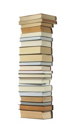 Photo of High stack of many different books isolated on white