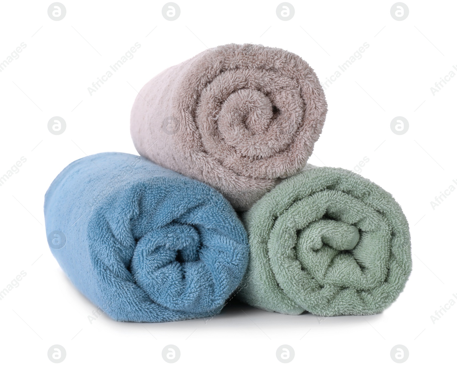 Photo of Rolled fresh clean towels on white background