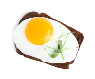 Photo of Tasty fried egg with sprouts and rye bread isolated on white, top view