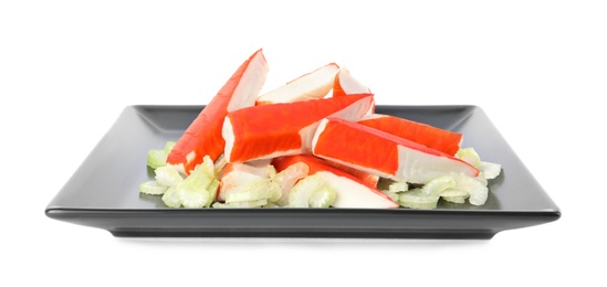 Fresh crab sticks with celery on white background