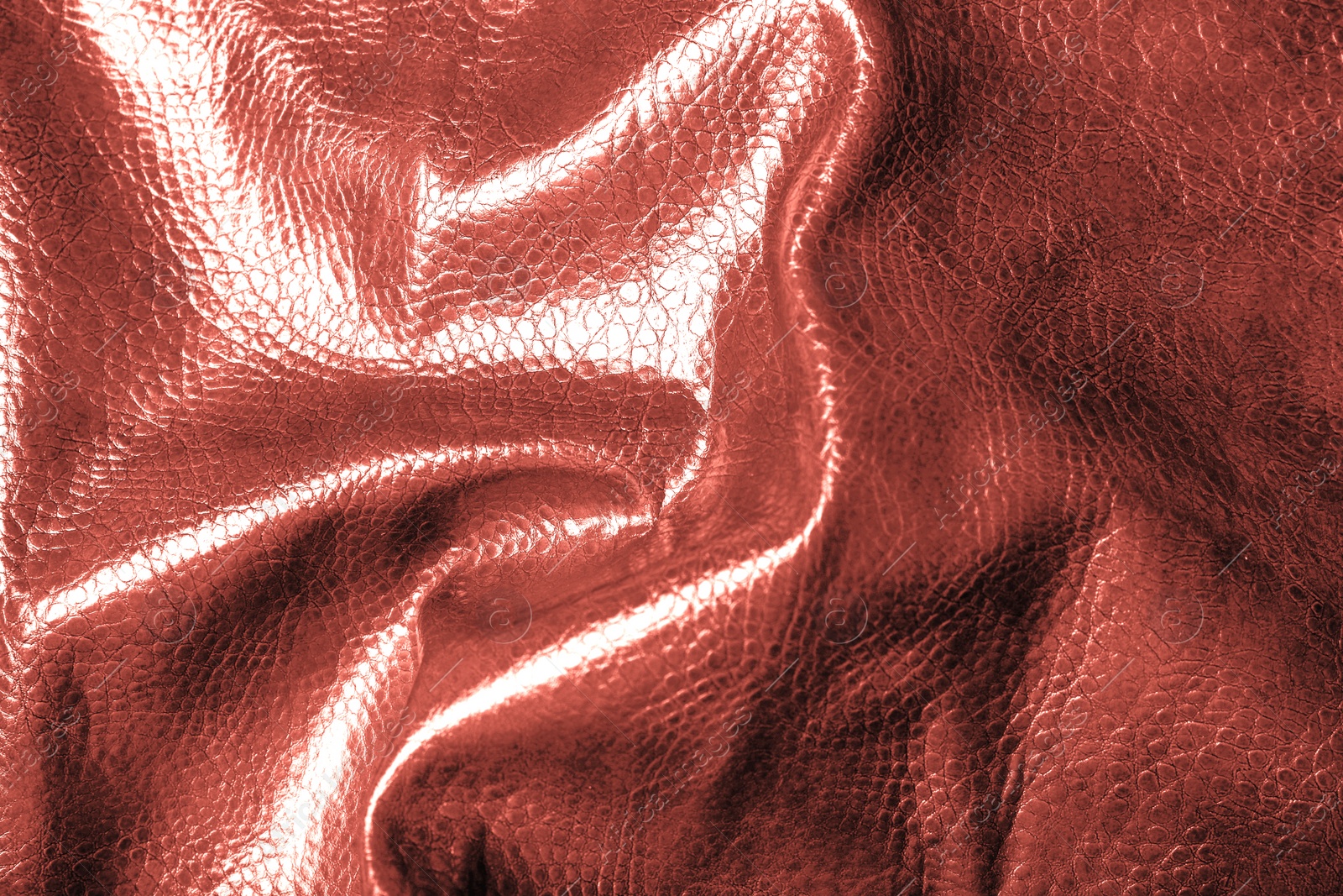 Image of Crumpled rose gold leather as background, closeup