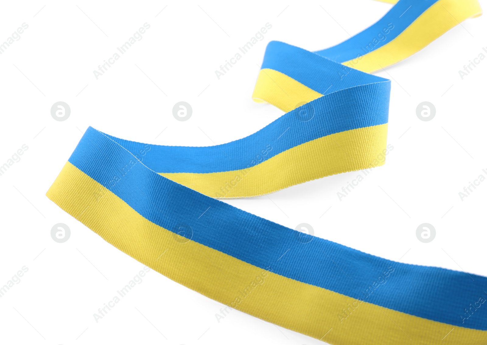 Photo of Ribbon with colors of national Ukrainian flag isolated on white